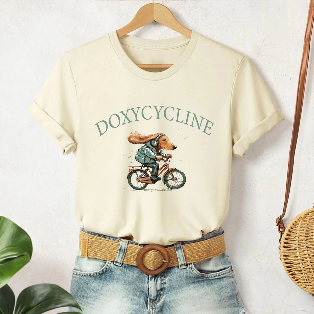 Doxycycline Pharmacy Pun T-Shirt, Dachshund on Bicycle